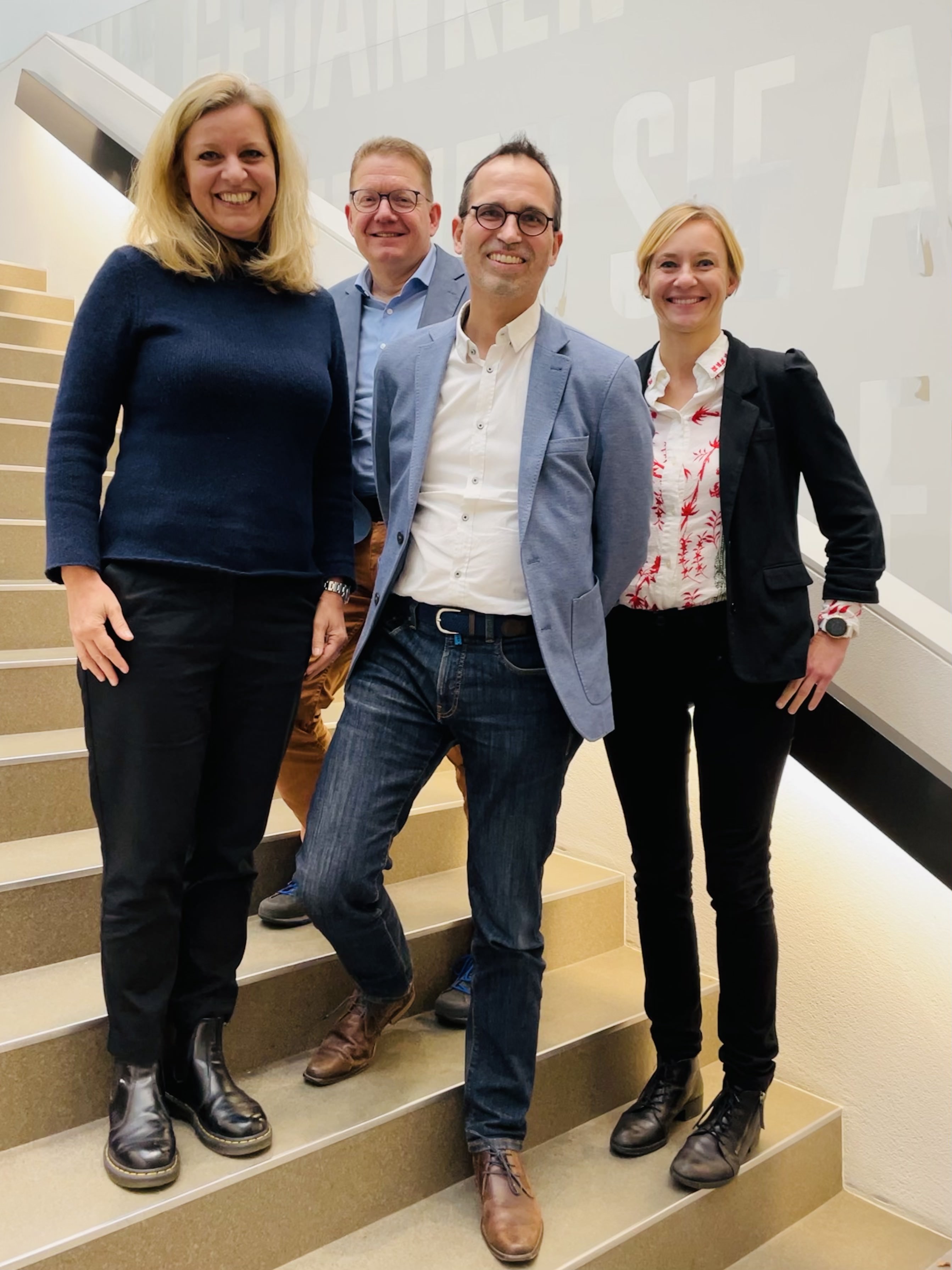 Auf dem Bild sind von links nach rechts zu sehen: Katrin Schmid, Bruno Revelin, Michael Hermann, Dr. Christiane Herre